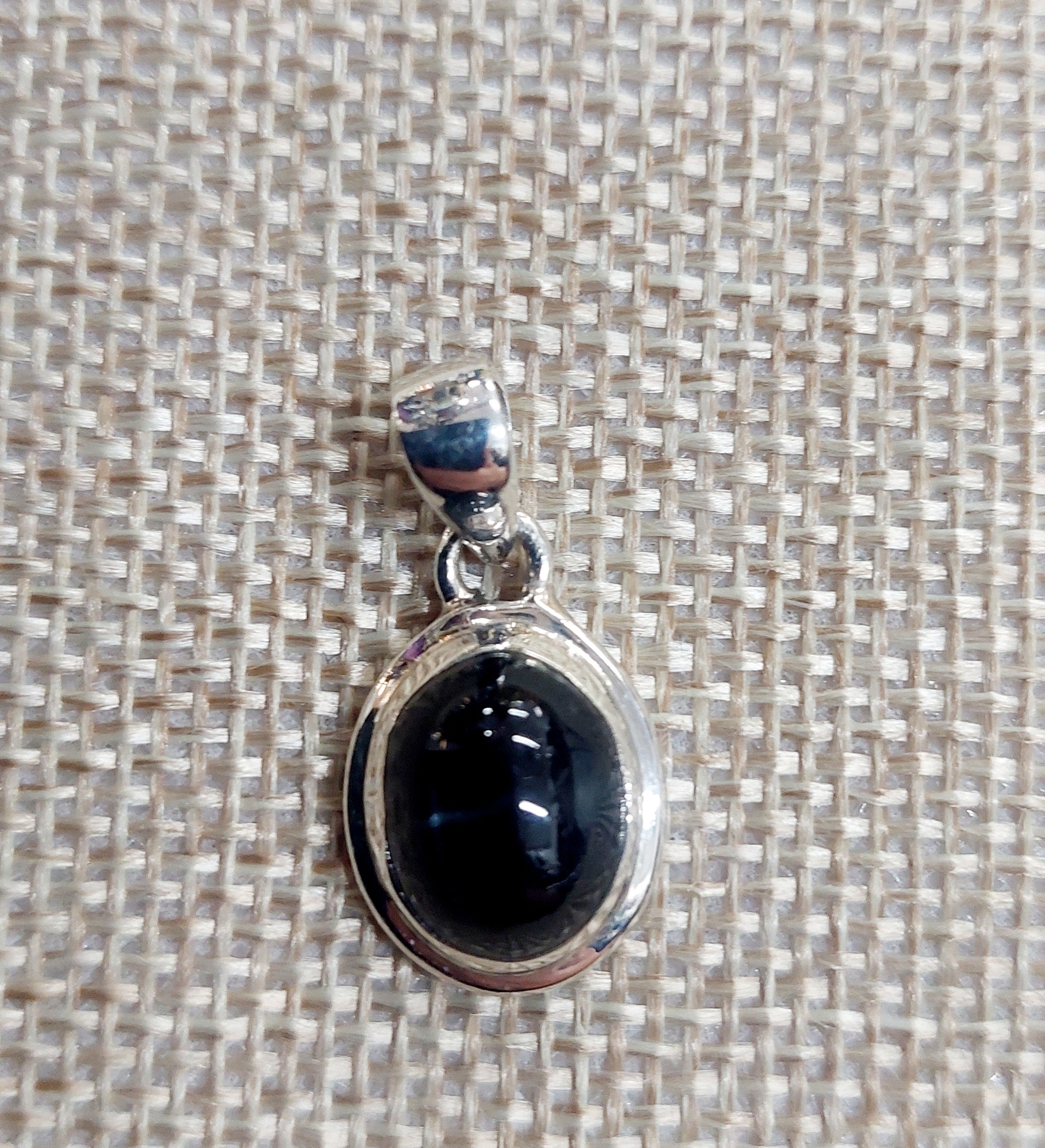 Black star shop sapphire pendant